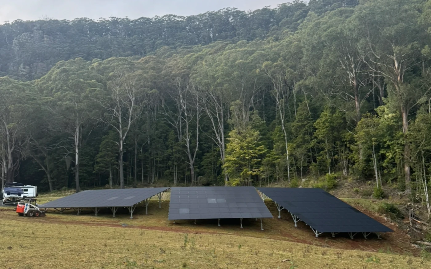 Ground-mounted off-grid solar array on a rural Central Coast property